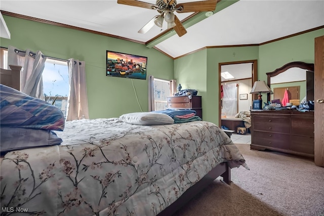 bedroom featuring carpet flooring, a ceiling fan, crown molding, and lofted ceiling