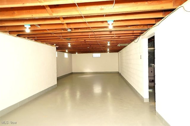 unfinished basement with baseboards