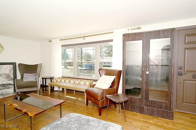 sitting room with wood finished floors