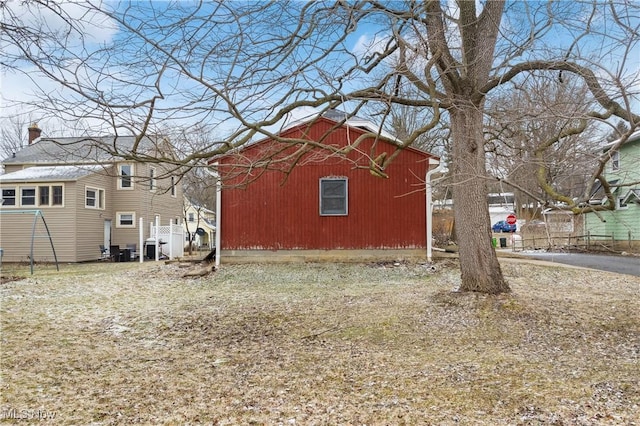 exterior space with a barn and an outdoor structure