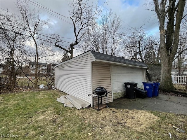 detached garage with fence