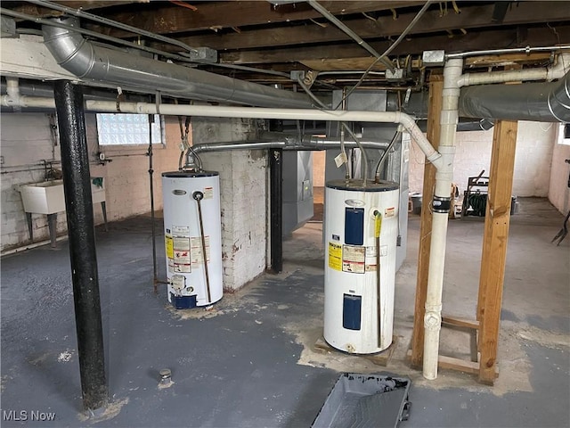 below grade area featuring water heater