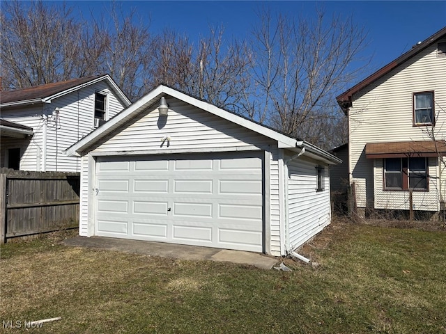 garage featuring fence