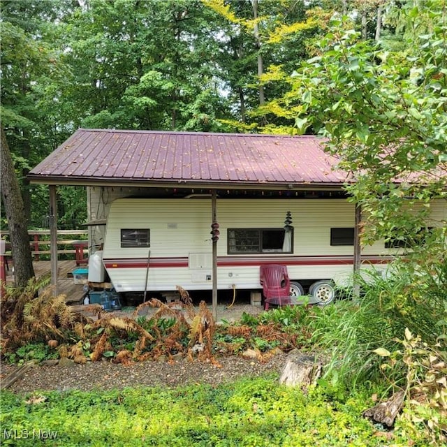 view of front of house featuring metal roof