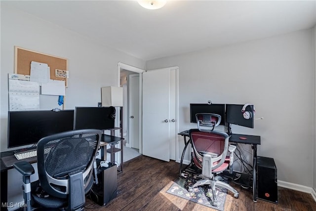 office with baseboards and wood finished floors