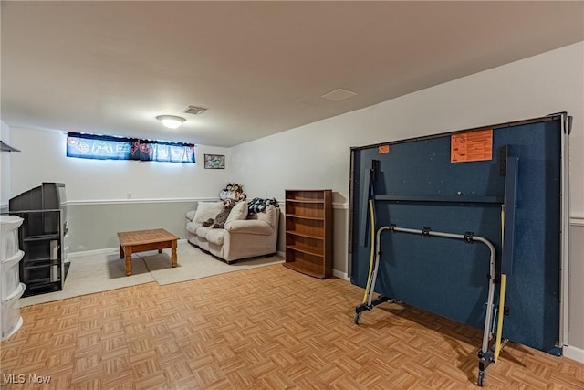 interior space featuring visible vents and baseboards