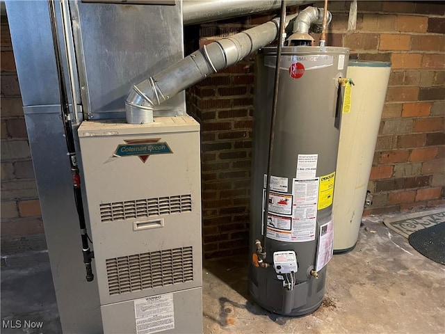 utility room with gas water heater and heating unit