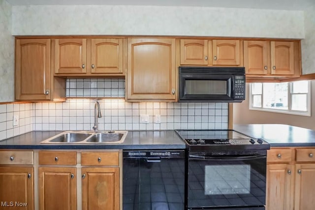 kitchen with black appliances, a sink, dark countertops, tasteful backsplash, and brown cabinetry