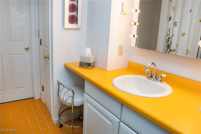 bathroom featuring tile patterned floors and vanity