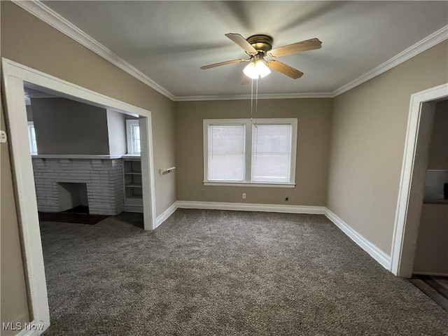 unfurnished bedroom with ornamental molding, a brick fireplace, baseboards, and dark colored carpet