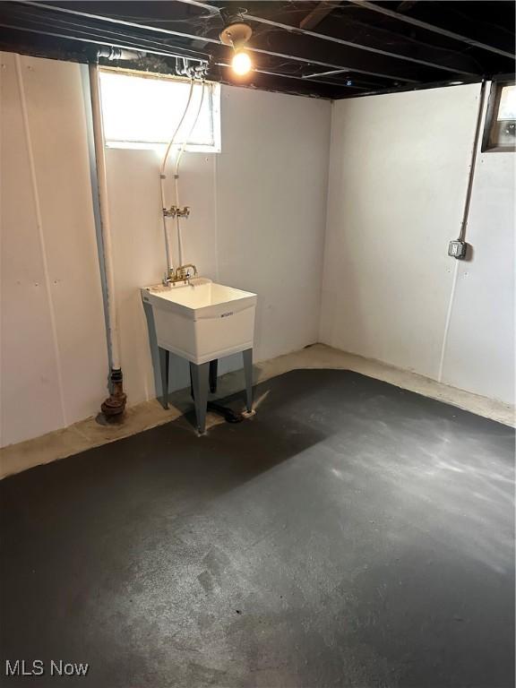 basement with a sink