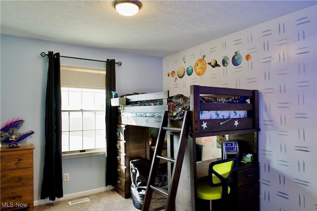 carpeted bedroom featuring visible vents, multiple windows, a textured ceiling, and baseboards