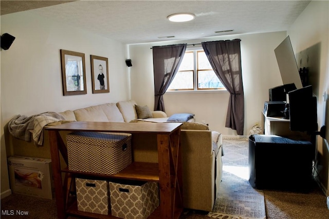 living room featuring visible vents and carpet flooring