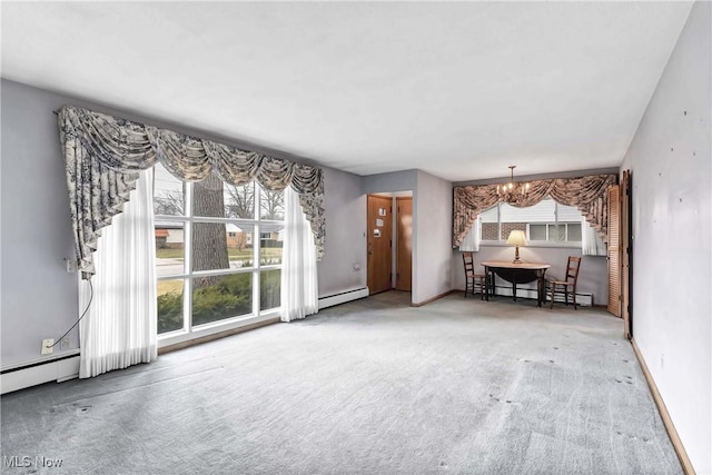 unfurnished living room with an inviting chandelier, baseboards, carpet floors, and a baseboard radiator