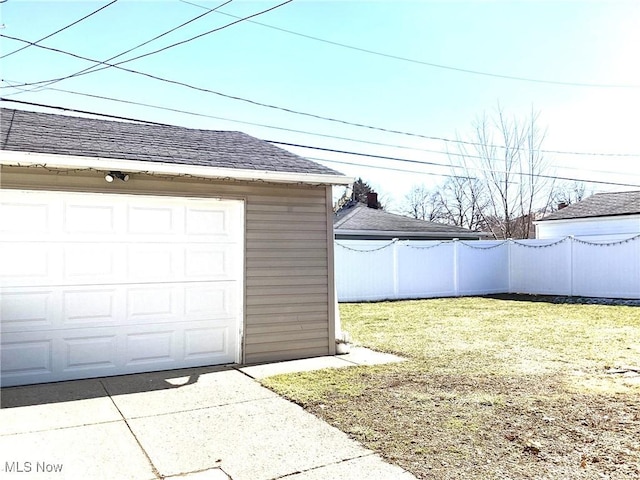 garage featuring fence