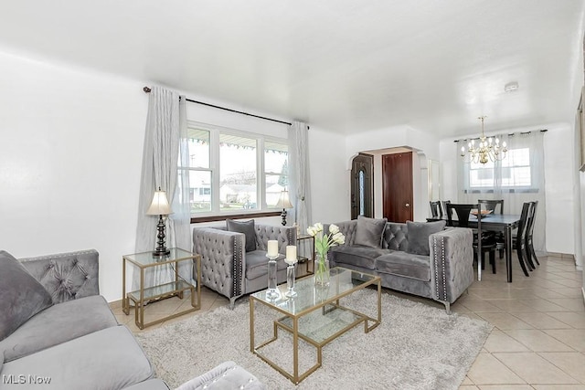 4707 Brookhigh Dr, Brooklyn, OH 44144 - tiled living area with an inviting chandelier