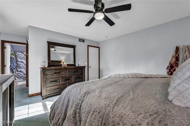 bedroom with baseboards, visible vents, and ceiling fan