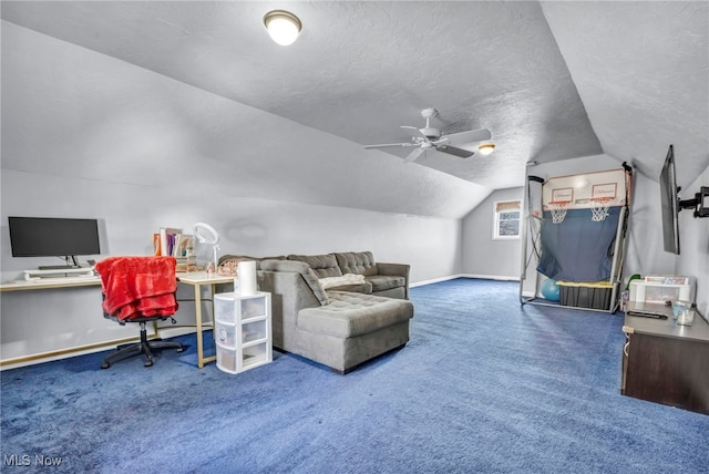 carpeted home office with baseboards, a textured ceiling, a ceiling fan, and vaulted ceiling