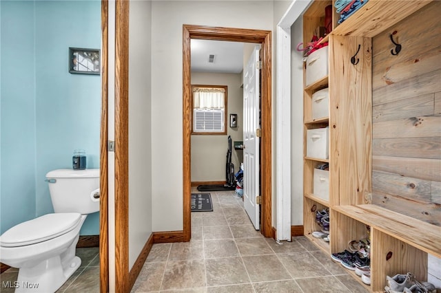 mudroom featuring visible vents, baseboards, and tile patterned flooring