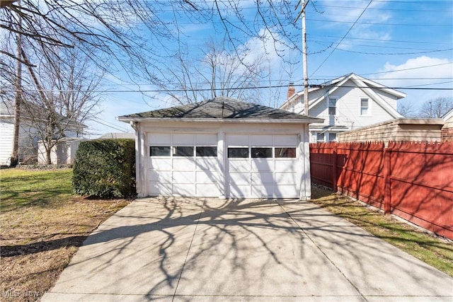 detached garage with fence