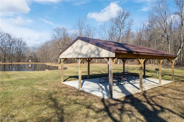 view of home's community with a gazebo, a lawn, and a patio area