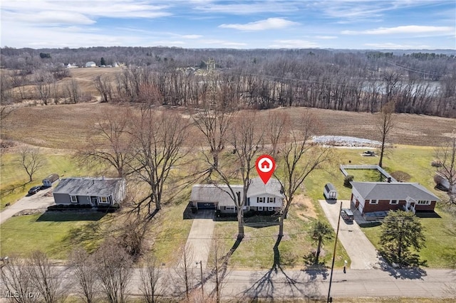 bird's eye view featuring a rural view and a forest view