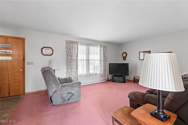 carpeted living room with baseboards