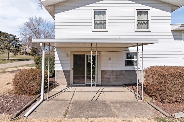 back of house with a patio