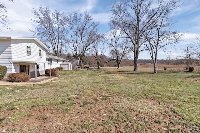 view of yard with a patio area