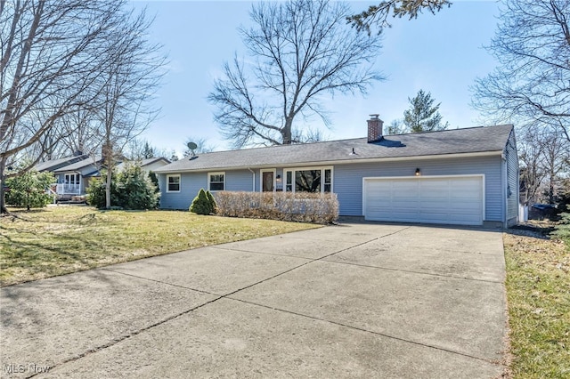 ranch-style house with a garage, driveway, a chimney, and a front lawn