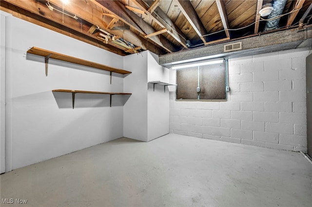 unfinished basement featuring visible vents