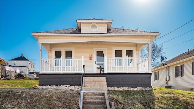 bungalow-style home featuring covered porch