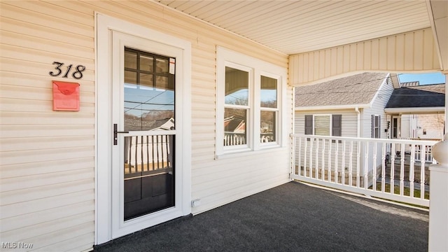 property entrance with a porch