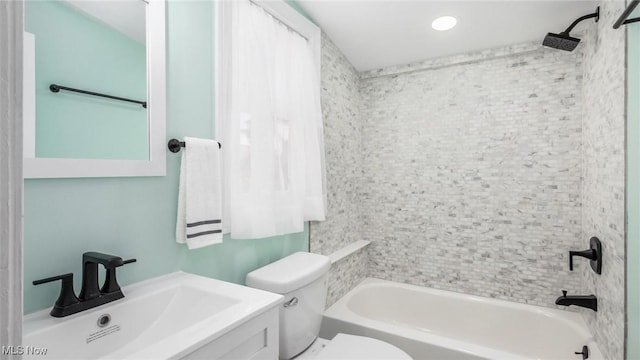 full bathroom with shower / bath combination, toilet, and vanity