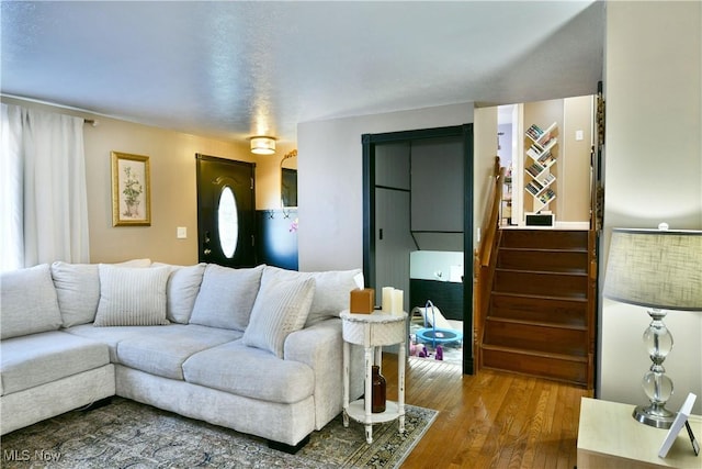 living area with wood finished floors