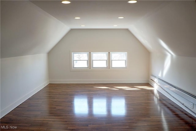 1341 Beach Ave, Lakewood, OH 44107 - additional living space featuring baseboards, lofted ceiling, and dark wood-style flooring