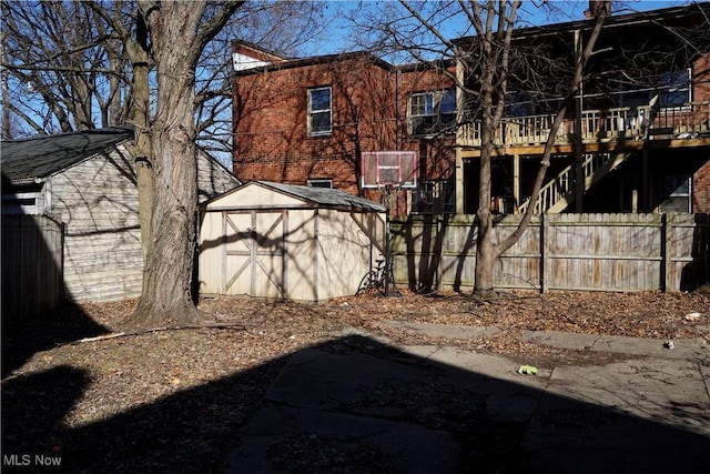 1341 Beach Ave, Lakewood, OH 44107 - view of yard featuring a storage shed, fence, and an outdoor structure