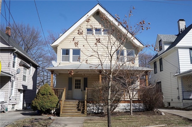 1341 Beach Ave, Lakewood, OH 44107 - american foursquare style home featuring covered porch