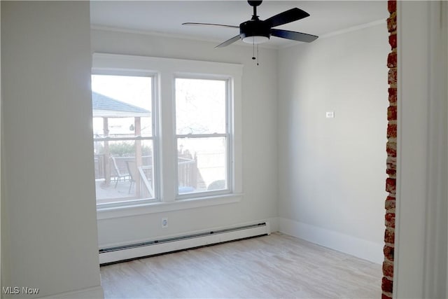 1341 Beach Ave, Lakewood, OH 44107 - spare room featuring a ceiling fan, wood finished floors, baseboards, a baseboard radiator, and crown molding