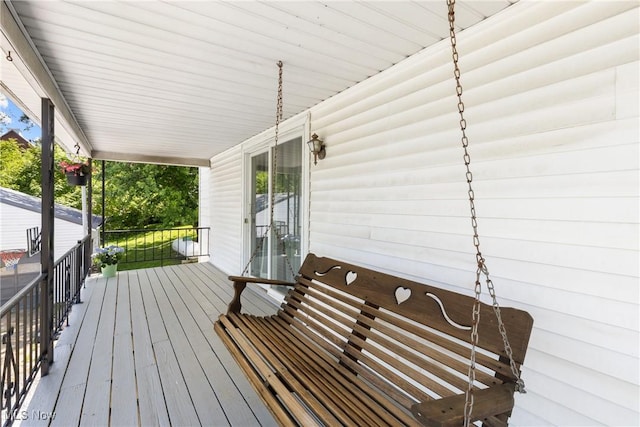 wooden deck featuring a porch