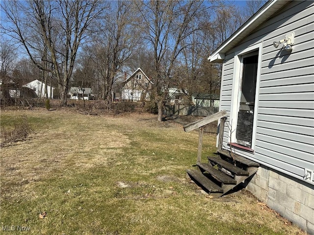 view of yard with entry steps