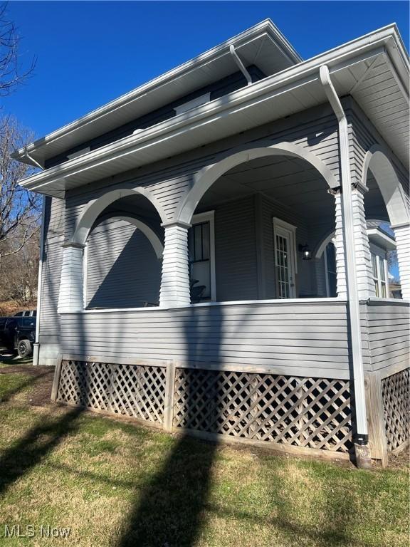 view of home's exterior with a porch