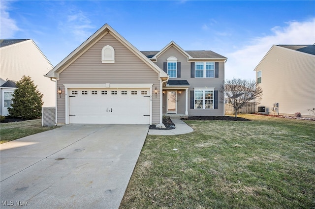 traditional-style home with an attached garage, driveway, central AC, and a front yard