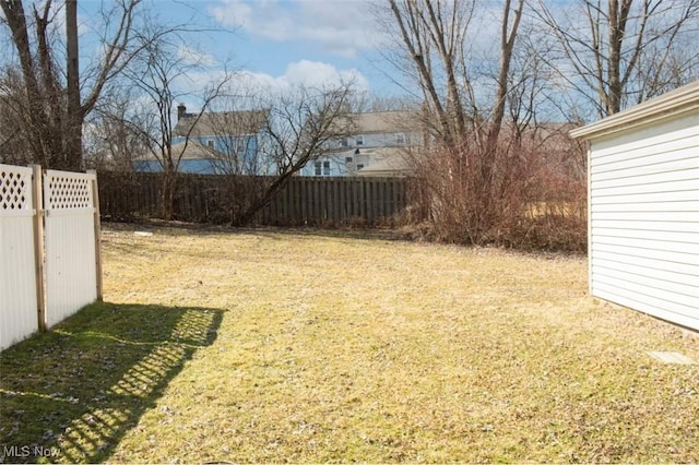 view of yard with fence