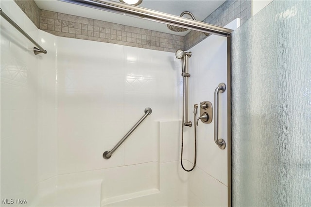 bathroom featuring an enclosed shower