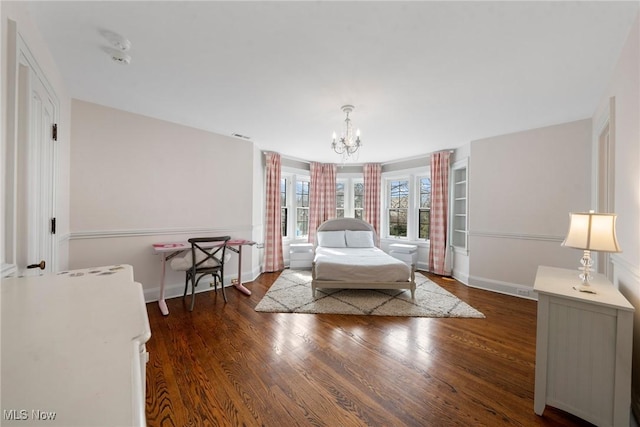 3006 Kingsley Rd, Shaker Heights, OH 44122 - bedroom with an inviting chandelier, wood finished floors, and baseboards