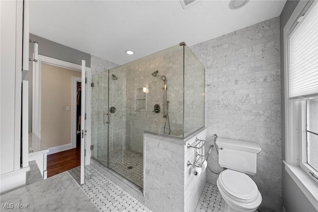 3006 Kingsley Rd, Shaker Heights, OH 44122 - bathroom with a shower stall, toilet, and tile walls