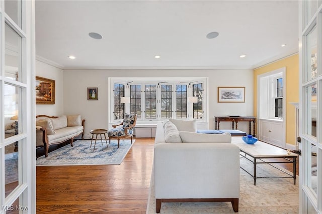 3006 Kingsley Rd, Shaker Heights, OH 44122 - living room featuring crown molding, plenty of natural light, light wood-style floors, and recessed lighting