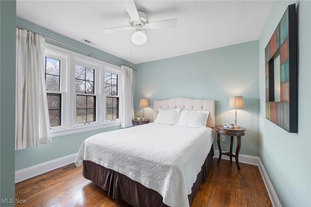 3006 Kingsley Rd, Shaker Heights, OH 44122 - bedroom with baseboards, dark wood-style floors, and a ceiling fan