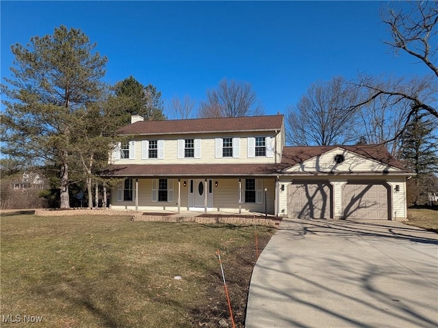 view of front of property featuring a porch, concrete driveway, a front yard, a chimney, and a garage